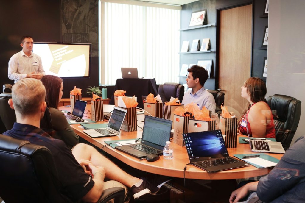 The Discover team in a client meeting